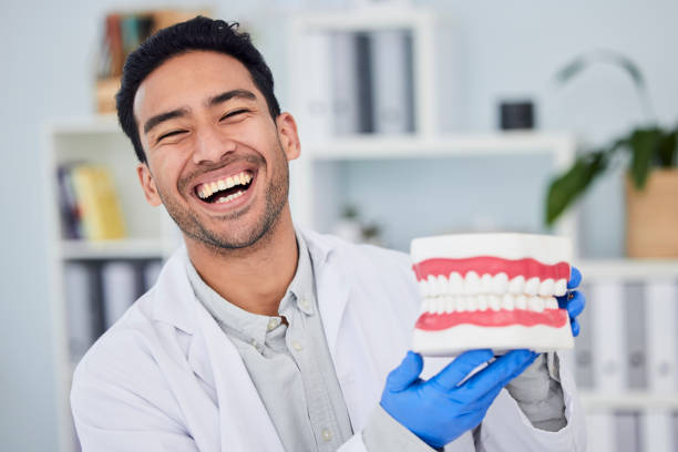 Portrait of male person or medical expert with big smile in happiness for oral, mouth and gum health at clinic hired through a dental staffing agency